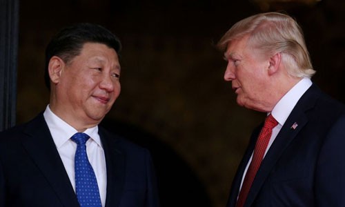 Tập Cận Bình (trái) gặp Donald Trump khi đến thăm Mỹ năm 2017. Ảnh: Reuters. 