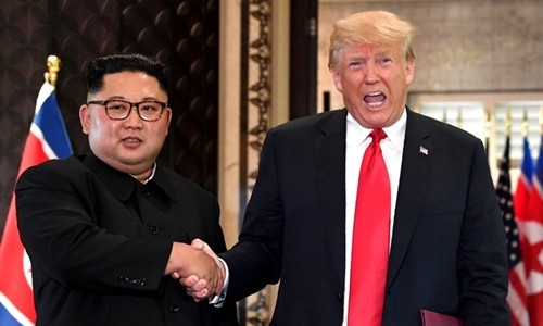 Tổng thống Mỹ Trump và lãnh đạo Triều Tiên Kim Jong-un tại Singapore tháng 6 năm ngoái. Ảnh: AFP.