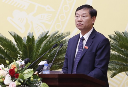 Chánh án Hà Nội Nguyễn Hữu Chính phát biểu tại phiên họp HĐND TP Hà Nội sáng 4/12. 