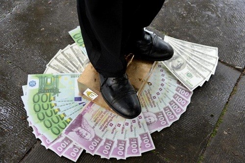 Những người giàu nhất thế giới đang ngày càng bỏ xa top cuối. Ảnh: AFP