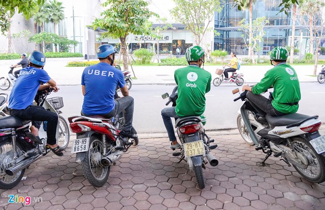 Bộ Tài chính chỉ ra bản chất của Uber, Grab là kinh doanh vận tải chứ không phải công nghệ. Ảnh: Quỳnh Trang.