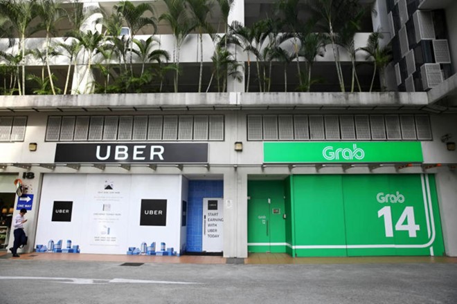 Thương vụ thâu tóm Uber Đông Nam Á của Grab đang bị đặt vấn đề vi phạm Luật Cạnh tranh.