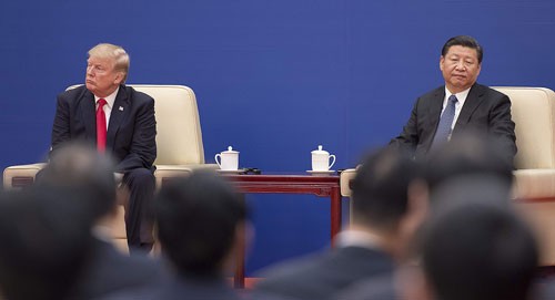 Tổng thống Mỹ Donald Trump (trái) và Chủ tịch Trung Quốc Tập Cận Bình trong cuộc gặp năm 2017. Ảnh: AFP.