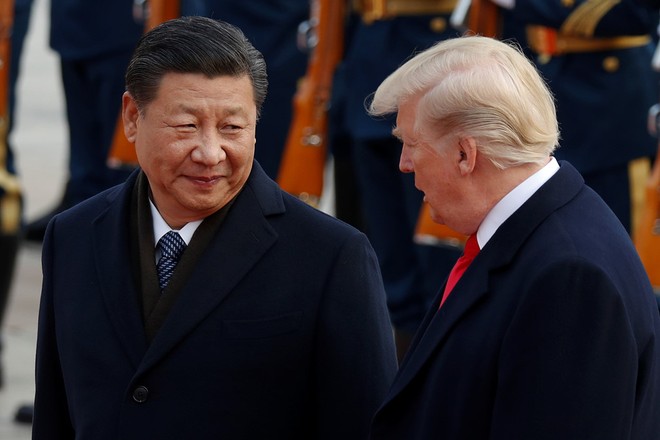 Chủ tịch Trung Quốc Tập Cận Bình tiếp Tổng thống Trump tại Bắc Kinh vào tháng 11/2017, khi chiến tranh thương mại chỉ mới là những lời đe dọa chứ chưa biến thành hành động. Ảnh: Reuters.