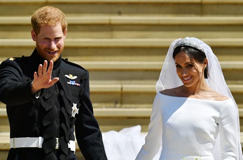 Hoàng tử Harry và vợ Meghan Markle trong hôn lễ ngày 19/5. Ảnh: AFP.