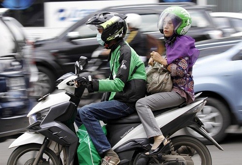 Dịch vụ xe ôm của Go - Jek tại Indonesia. Ảnh: Reuters