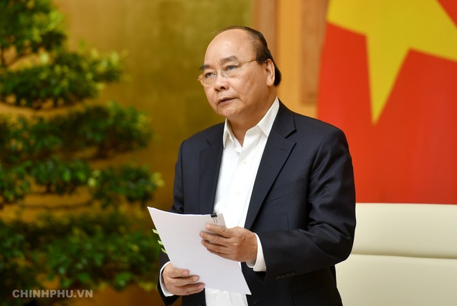 Thủ tướng Nguyễn Xuân Phúc phát biểu kết luận phiên họp thứ nhất Tiểu ban Kinh tế - Xã hội. Ảnh: VGP/Quang Hiếu