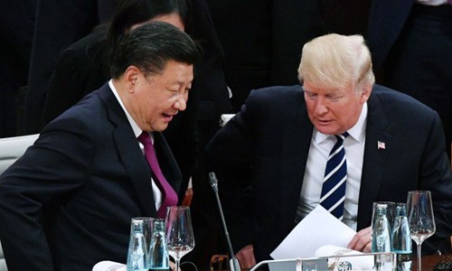 Tổng thống Mỹ Trump, phải, và Chủ tịch Trung Quốc Tập Cận Bình, cùng dự G20 năm nay tại Argentina. Ảnh: SCMP.