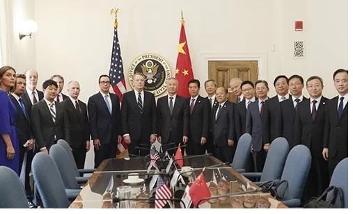Hai đoàn đàm phán Mỹ - Trung gặp nhau tại Washington tuần trước. Ảnh: Xinhua.