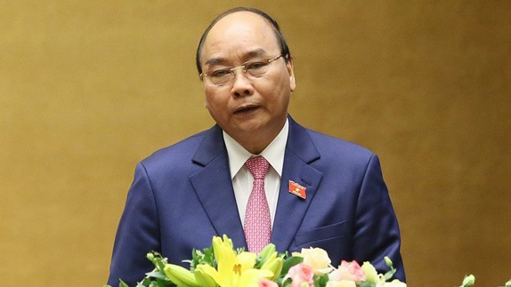 Thủ tướng Chính phủ Nguyễn Xuân Phúc trình bày Báo cáo tại phiên khai mạc kỳ họp thứ 8 Quốc hội khóa XIV.