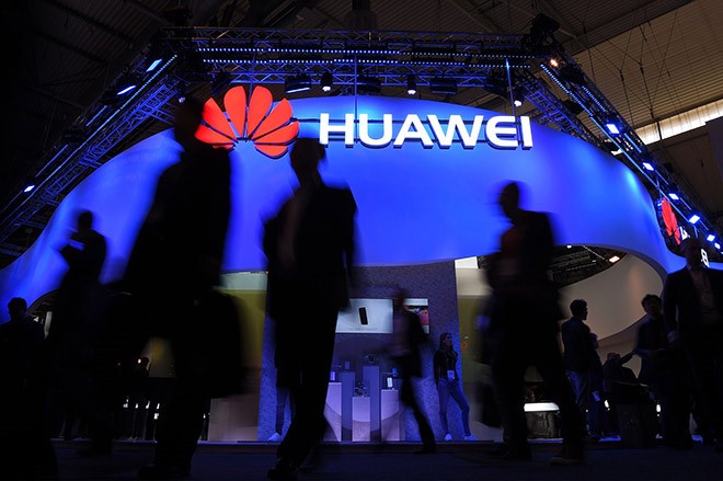 Huawei đã chi tiền để mua đến 500 bằng sáng chế từ các công ty ngoài Trung Quốc. Ảnh: AFP.