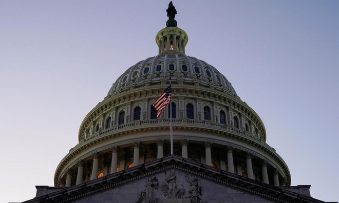 Tòa nhà quốc hội Mỹ trên đồi Capitol hôm 18/12. Ảnh: Reuters.