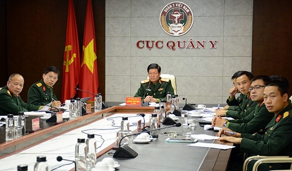 Thiếu tướng, PGS.TS Nguyễn Xuân Kiên cùng các thành viên Đoàn Việt Nam tại điểm cầu Hà Nội. Ảnh QĐND