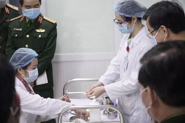 Các khâu chuẩn bị để tiêm thử vắcxin Nano Covax. (Ảnh: Hiếu Hoàng/Vietnam+).