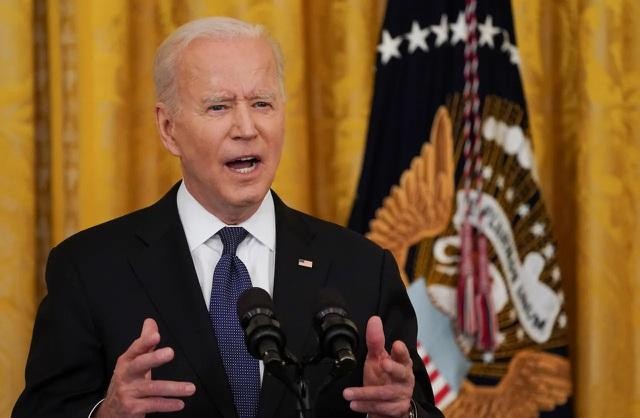 Tổng thống Mỹ Joe Biden lệnh cho cộng đồng tình báo Mỹ điều tra và báo cáo về nguồn gốc Covid-19 trong vòng 90 ngày (Ảnh: Reuters).