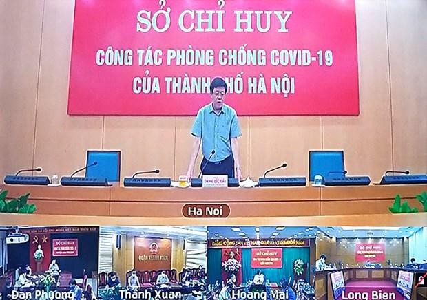 Ông Dương Đức Tuấn, Phó Chủ tịch UBND thành phố Hà Nội họp với các đơn vị về công tác phòng, chống COVID-19. (Ảnh: PV/Vietnam+).