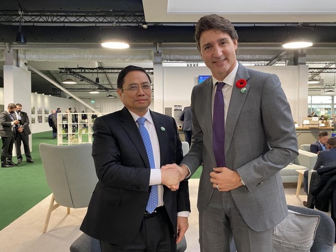 Thủ tướng Chính phủ Phạm Minh Chính và Thủ tướng Canada Justin Trudeau - Ảnh: TTXVN.