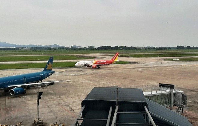 Máy bay của các hãng hàng không tại sân bay Nội Bài. (Ảnh: Việt Hùng/Vietnam+).