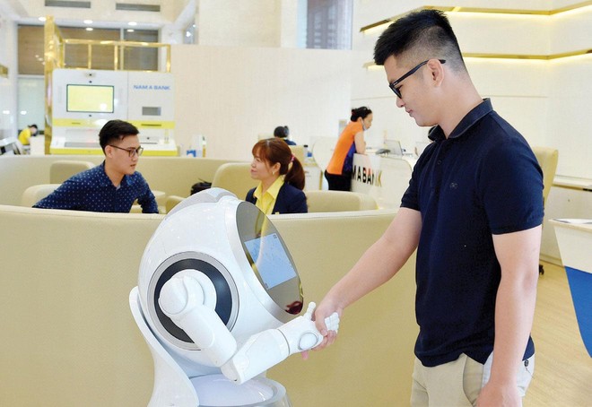 Nam A Bank ghi dấu ấn trên thị trường tài chính khi là ngân hàng Việt đầu tiên đưa robot vào phục vụ giao dịch.