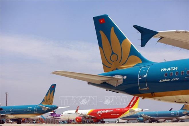 Máy bay của các hãng hàng không tại sân bay Nội Bài (Hà Nội). Ảnh tư liệu: TTXVN.