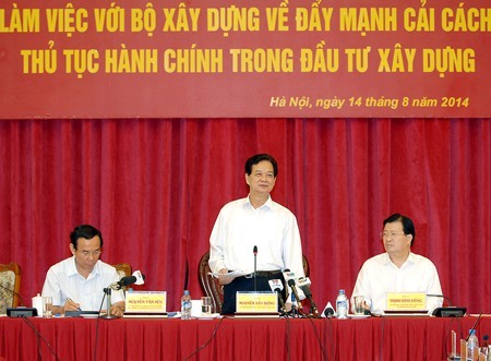 Thủ tướng Chính phủ Nguyễn Tấn Dũng làm việc với Bộ Xây dựng - Ảnh: VGP