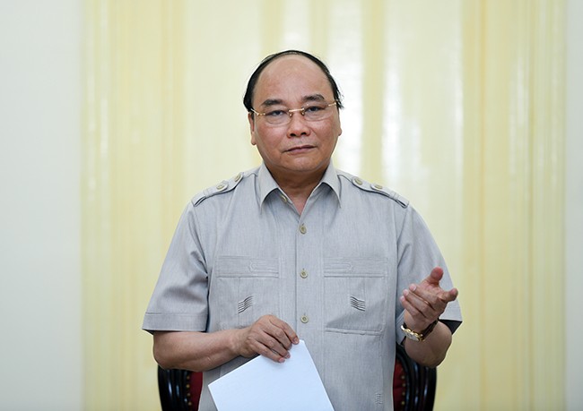 Thủ tướng Nguyễn Xuân Phúc: Kiên quyết giữ vững các mục tiêu, chỉ tiêu kinh tế-xã hội đã đề ra - Ảnh: VGP/Quang Hiếu 