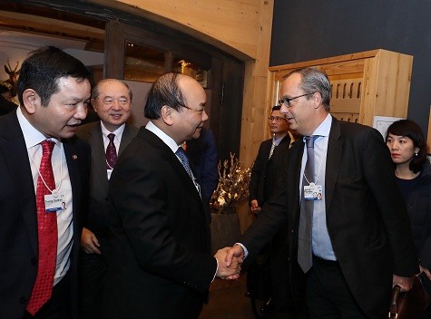 Thủ tướng gặp cáctập đoàn thành viên WEF trong lĩnh vực công nghệ thông tin. Ảnh: VGP