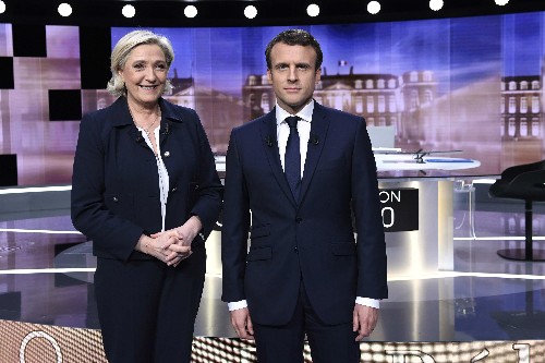 Marine Le Pen (trái) và Emmanuel Macron. Ảnh:Reuters