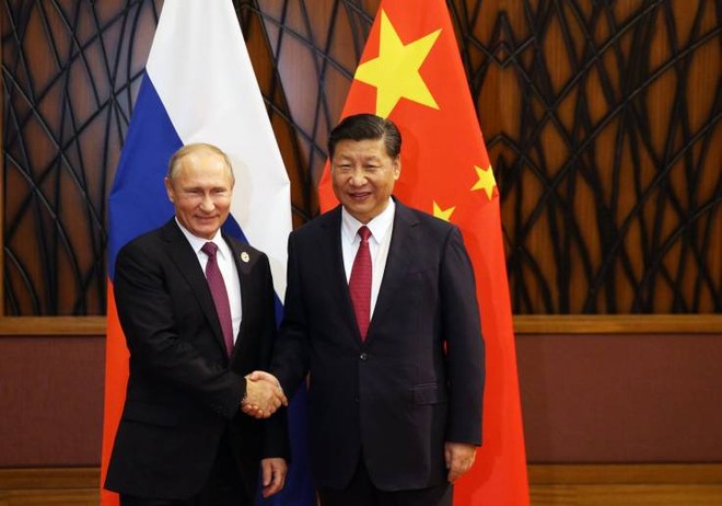 Tổng thống Nga Vladimir Putin và Chủ tịch Trung Quốc Tập Cận Bình. Ảnh: AFP.