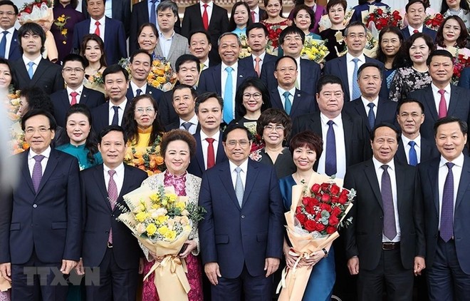 Thủ tướng Chính phủ Phạm Minh Chính gặp gỡ các doanh nghiệp, doanh nhân tiêu biểu hôm 12/12/2021 (Ảnh: TTXVN)