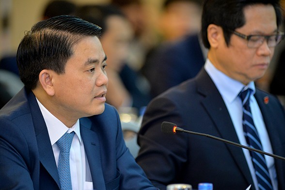 Chủ tịch Hà Nội và Chủ tịch Phòng Thương mại và Công nghiệp Việt Nam tại buổi đối thoại (ảnh enternews)