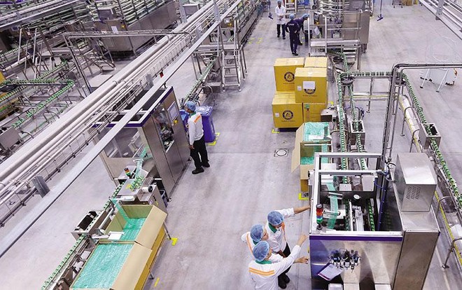 Dây chuyền sản xuất tại Nhà máy sữa nước của Nestlé tại Hưng Yên. Ảnh: Đức Thanh