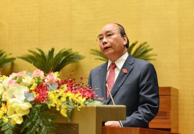 Thủ tướng Chính phủ Nguyễn Xuân Phúc báo cáo trước Quốc hội (Ảnh Duy Linh).