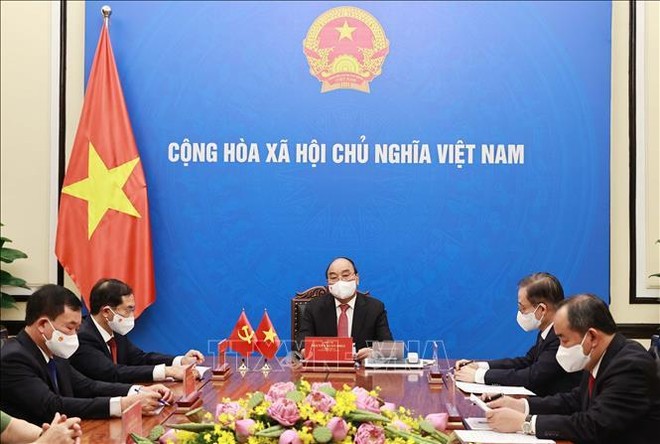 Chủ tịch nước Nguyễn Xuân Phúc khẳng định, Việt Nam coi trọng phát triển quan hệ láng giềng hữu nghị, đối tác hợp tác chiến lược toàn diện với Trung Quốc. (Ảnh TTXVN)
