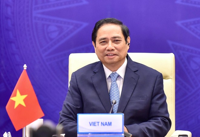 Thủ tướng Phạm Minh Chính dẫn đầu Đoàn Việt Nam tham dự Hội nghị (Ảnh: Nhật Bắc)
