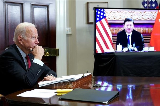 Tổng thống Mỹ Joe Biden và Chủ tịch Trung Quốc Tập Cận Bình tại cuộc gặp trực tuyến ngày 15/11/2021. Ảnh tư liệu: AFP/TTXVN