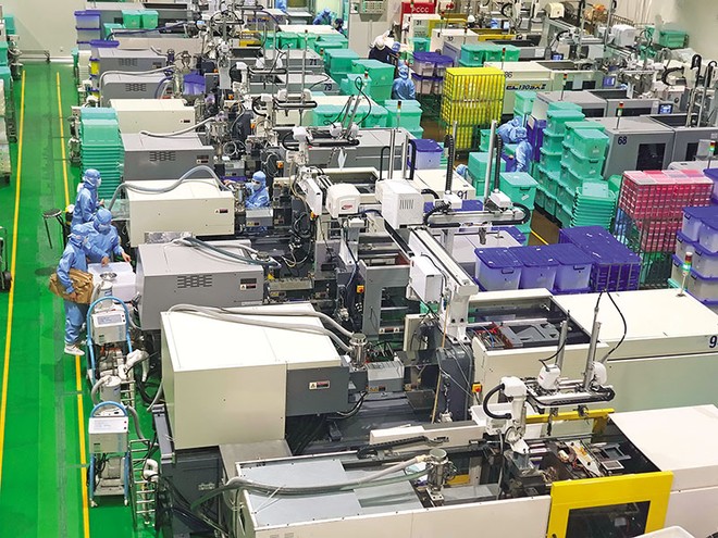 Dây chuyền sản xuất vật liệu tổng hợp composite của Công ty NIKKISO (Nhật Bản) tại TP.HCM. Ảnh: Lê Toàn 