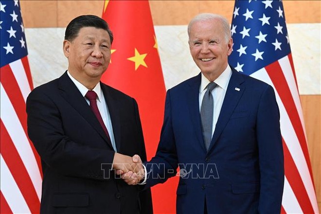 Tổng thống Mỹ Joe Biden (phải) và Chủ tịch Trung Quốc Tập Cận Bình (trái) tại cuộc gặp ở Bali, Indonesia, ngày 14/11/2022. Ảnh tư liệu: AFP/TTXVN