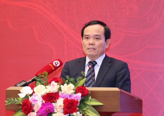 Phó thủ tướng Trần Lưu Quang trình bày báo cáo (Ảnh: Duy Linh).