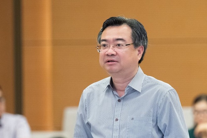  Bộ trưởng Bộ Xây dựng Nguyễn Thanh Nghị trình bày tờ trình Dự án Luật .