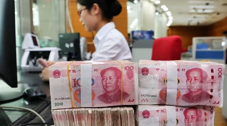 Quyết định cắt giảm 25 điểm cơ bản tỷ lệ dự trữ bắt buộc của Ngân hàng Trung ương Trung Quốc được kỳ vọng sẽ bơm 500 tỷ nhân dân tệ thanh khoản vào nền kinh tế. Ảnh: AFP.