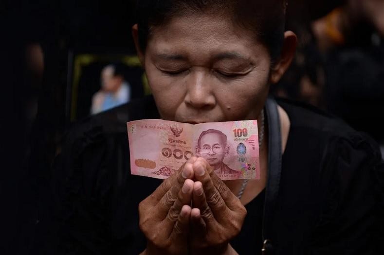 Dự trữ ngoại hối cạn kiệt là nguyên nhân dẫn đến sự sụp đổ của đồng baht Thái Lan trong cuộc khủng hoảng tài chính năm 1997. Ảnh tư liệu: AFP
