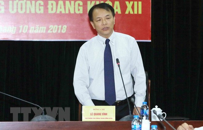 Ông Lê Quang Vĩnh, Phó Chánh Văn phòng Trung ương Đảng trả lời câu hỏi của các phóng viên. (Ảnh: Phương Hoa/TTXVN).