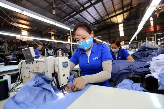 CPTPP được kỳ vọng sẽ tạo cú hích cho nhiều ngành hàng của Việt Nam, trong đó có ngành dệt may. (Ảnh: Danh Lam/TTXVN).