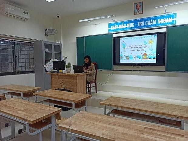 Những lớp học vắng học sinh vì dịch COVID-19. (Ảnh: Phạm Mai/Vietnam+).