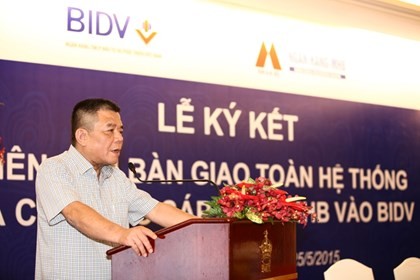 Ông Trần Bắc Hà, Chủ tịch HĐQT BIDV phát biểu tại lễ ký kết biên bản bàn giao toàn hệ thống và công bố sáp nhập MHB vào BIDV - Ảnh: Lê Toàn