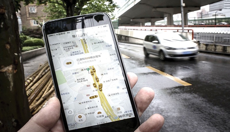 Didi đã mua lại 
Uber Trung Quốc sau thời gian dài cạnh tranh quyết liệt 