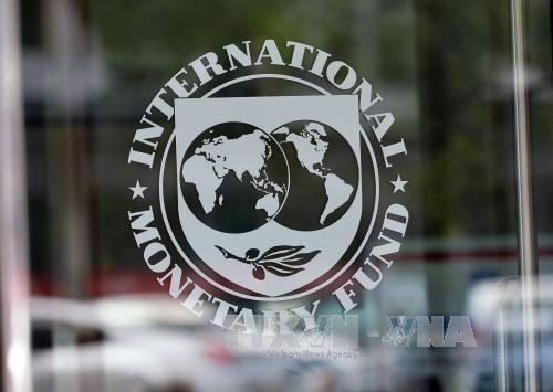 IMF quan ngại đà phục hồi kinh tế toàn cầu. Ảnh minh họa: TTXVN