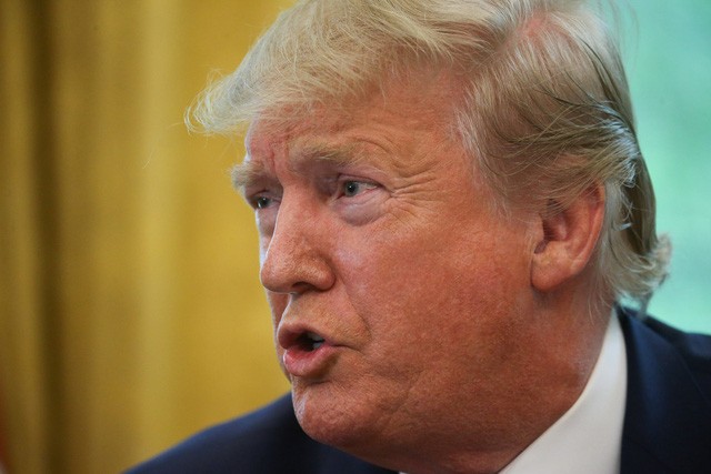 Tổng thống Mỹ Donald Trump phát biểu tại Phòng bầu dục ở Nhà Trắng ngày 26-7-2019 - Ảnh: REUTERS