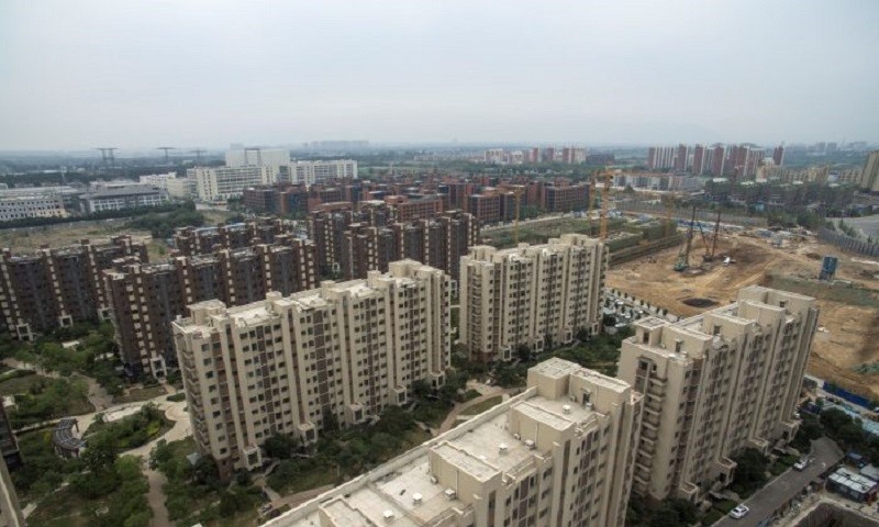 Doanh số bất động sản tính theo mét sàn tại Trung Quốc tăng 9,7% trong tháng 5. Ảnh: AFP